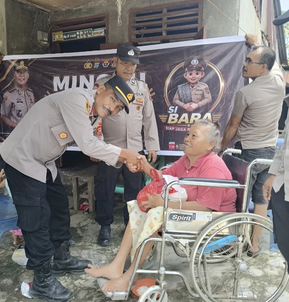 Kapolsek Medang Deras AKP Alfander H. Sagala Berbagi di Minggu Kasih